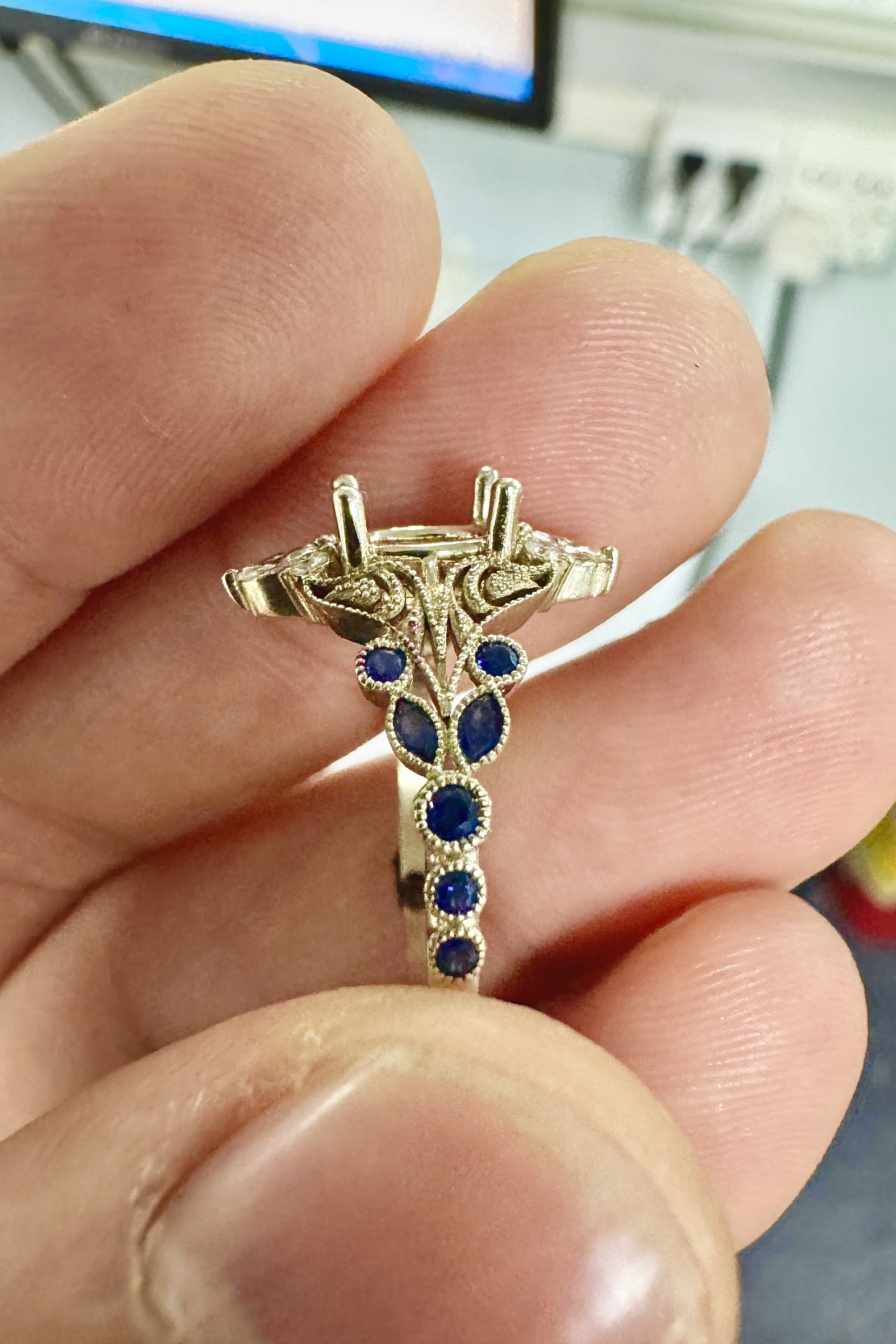 Sapphires being set on 14kt white gold setting