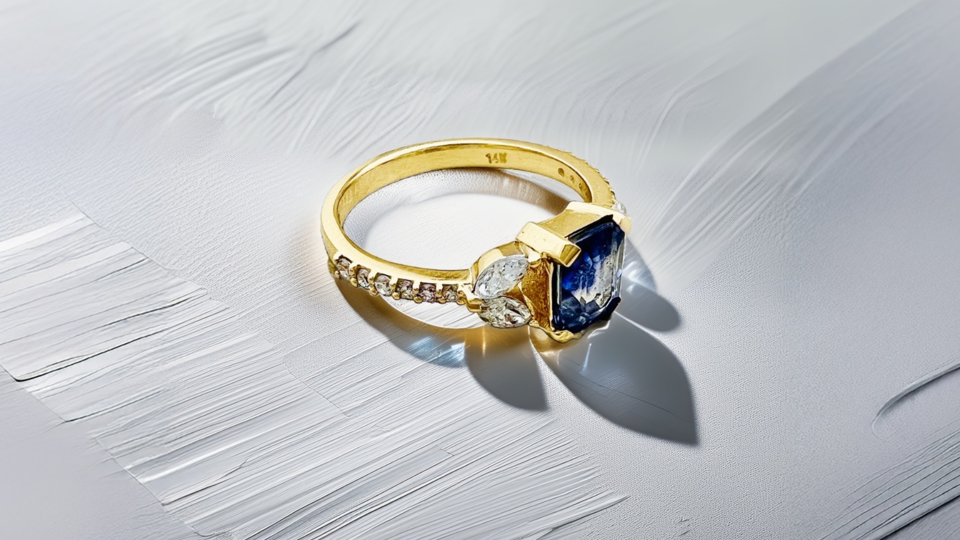 sapphire engagement ring made in 14kt yellow gold and natural diamonds